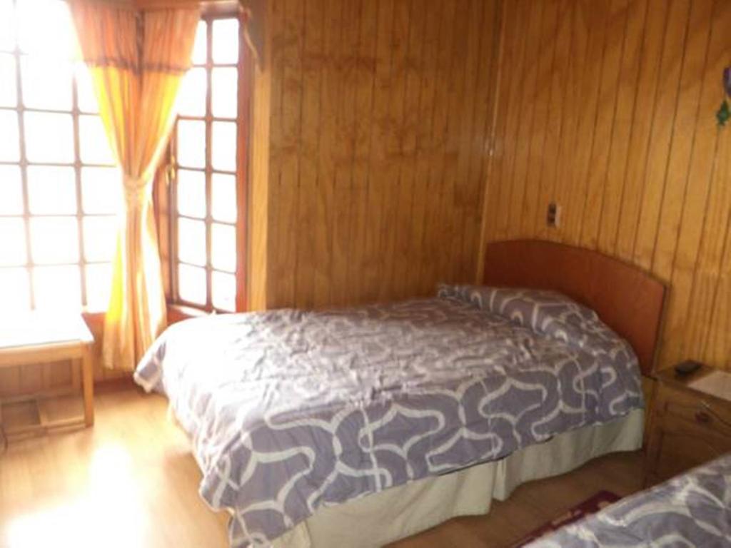Hostal Lagunitas Puerto Montt Habitación foto